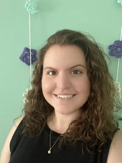 Professional headshot of the therapist